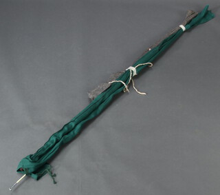 Two vintage sea fishing rods, both in cloth bags 