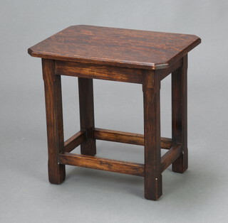 An oak lozenge shaped occasional table on square supports 47cm h x 48cm w x 36cm d 