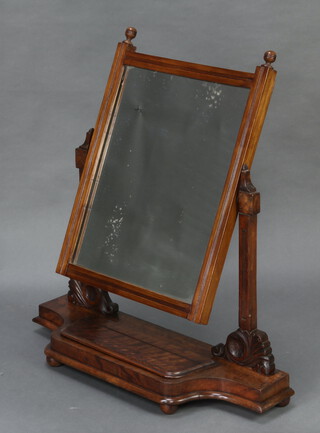 A 19th Century rectangular plate dressing table mirror contained in an mahogany swing frame 86cm h x 76cm w x 25cm d 