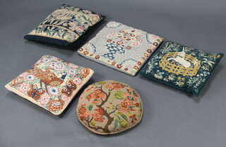 Five Berlin wool work cushions 