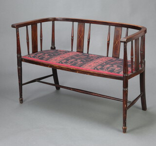 An Edwardian inlaid mahogany double chair back settee with splat and bobbin decoration, upholstered seat, raised on turned supports with H framed stretcher 73cm h x 107cm w x 46cm d (seat 87cm x 35cm) 