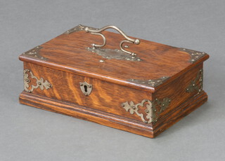 An Edwardian rectangular oak trinket box with metal mounts and hinged lid 8cm h x 23cm w x 6cm d