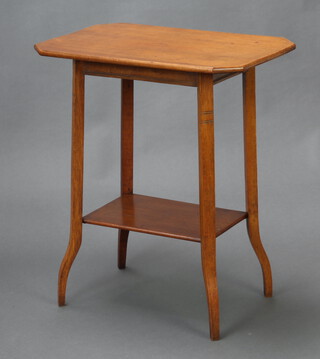 An Edwardian rectangular mahogany 2 tier occasional table on outswept supports 71cm x 60cm x 40cm 