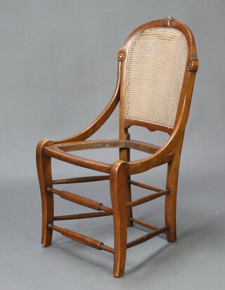 A Victorian carved walnut chair with woven cane back raised on turned supports 80cm h x 43cm w x 40cm d (seat 30cm x 32cm, caning to seat is missing) 