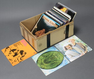 A collection of 1970's and later 33rpm album vinyl records including ELO, The Monkees, Abba, Beach Boys, Wings, Bee Gees, Status Quo etc