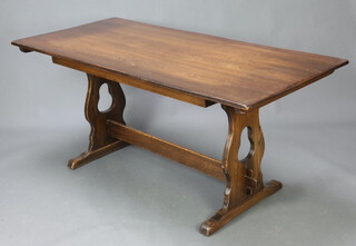An elm refectory style dining table, raised on standard end supports with H framed stretcher 73cm h x 188cm l x 76cm w (slight water mark to the top and light contact marks in places) 