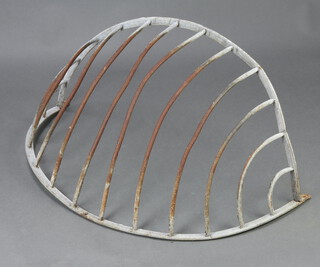 A metal wall manger 44cm h x 97cm w x 56cm d 