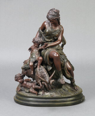 A Victorian style resin figure of mother and child, raised on an oval base 38cm x 32cm 