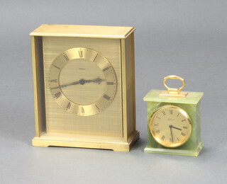 A Helveco timepiece with gilt dial and Roman numerals contained in an onyx case 10cm h x 10cm w x 6cm d, an Angelus timepiece contained in a gilt metal case 22cm h x 18cm w x 8cm d 
