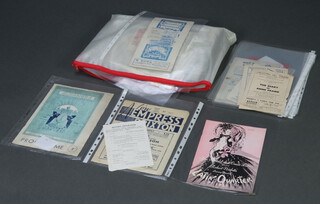 A collection of theatre programmes, dinner menus etc