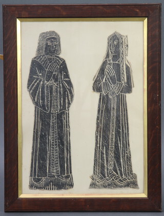 A brass rubbing of Edmund Saunders and Johanna, contained in an oak frame  60cm x 43cm 