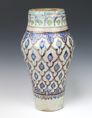 A 19th Century Isnic baluster vase decorated with stylised flower heads 43cm, converted to a table lamp (crack to the body)