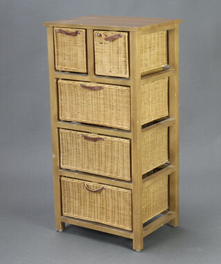 A pine framed chest fitted 2 short and 3 long baskets 90cm h x 45cm w x 35cm d 