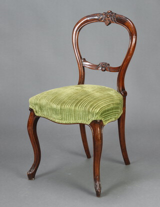 A Victorian carved mahogany balloon back dining chair with over stuffed seat raised on cabriole supports 86cm h x 44cm w x 41cm d (seat 31cm x 26cm) 