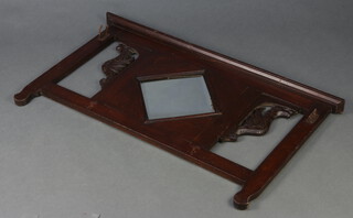 An Edwardian oak hat and coat rack with bevelled plate lozenge mirror 56cm h x 94cm w (some hooks missing) 