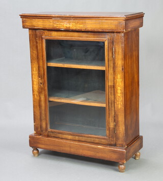 A Victorian inlaid walnut pier cabinet, fitted shelves enclosed by a glazed panelled door 106cm h x 80cm w x 34cm d (some veneers missing in places)