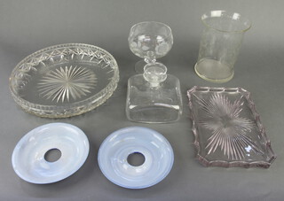 A squat square glass decanter and stopper 15cm, 2 shallow dishes, 2 vases and 2 blue glass candle holders