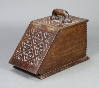 A Victorian carved oak coal box with hinged lid complete with zinc liner 28cm h x 51cm w x 25cm d 