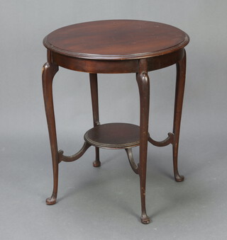 An Edwardian mahogany circular two tier occasional table raised on cabriole supports 70cm h x 59cm diam (light scratching and ring marks)