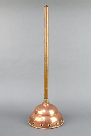 A Simplex no.9 copper washing dolly with turned wooden handle 65cm h x 21cm w 