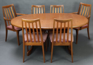 Mid Century, a teak G Plan oval extending dining table with concealed extra leaf, raised on splayed supports with H framed stretcher 72cm h x 107cm w x 163cm d (some bleaching to the top) together with a set of 6 G Plan teak stick and rail back dining chairs 2 carvers, 4 standard PLEASE NOTE - these chairs are not being sold with their seats as they do not comply with Fire Safety Standards