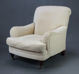 A Marks & Spencer Howard style armchair upholstered in cream coloured material (dents to the arms)