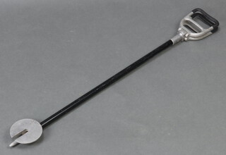 A metal framed folding shooting stick