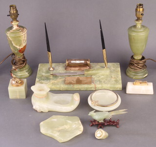 An onyx desk set, a pair of ditto baluster table lamps, 2 cigarette lighters, 3 dishes, a timepiece and a bird