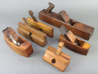 A Victorian hand plane stamped H Woolley, 5 other planes