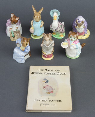 A collection of Beswick Beatrix Potter figures, Ribby 8cm, Tale of Gloucester 9cm,  Jet Cotton Tail 9.5cm, Jemima Puddleduck 10cm, hunca Munca Sweeping 8cm, Lady Mouse made a Curtsy 8cm and Mrs Flopsy Bunny 10cm (chipped ear) together with a book The Tale of Jemima Puddleduck