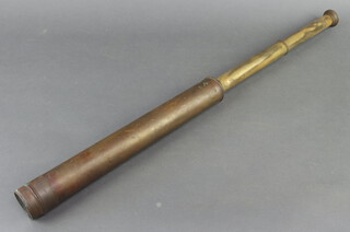 A brass 2 draw telescope 74cm (the cap is missing)