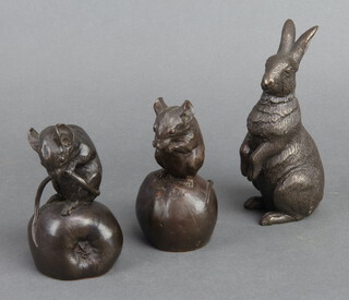 A bronzed figure of a mouse on an apple 12cm, a ditto 11cm and a hare 15cm