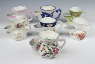 An Edwardian shaving mug decorated flowers and 6 others (all have minor chips to the rims)