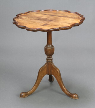 Holland House, a reproduction Georgian circular mahogany snap top wine table with bracketed border, raised on a pillar and tripod base 56cm h x 51cm diam. (scratches and ring marks to the top) 