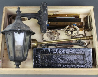 An iron letterbox, a ditto wall lantern and a quantity of door furniture