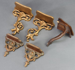 Two pairs of gilt finished wall brackets 26cm h x 19cm w x 11cm d and 18cm h x 16cm w x 9cm d together with one other corner wall bracket, 20cm h x 14cm w x 21cm d