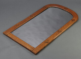 A rustic Arts & Crafts style arched plate mirror contained in an oak frame 106cm h x 60cm w (crack to the frame)