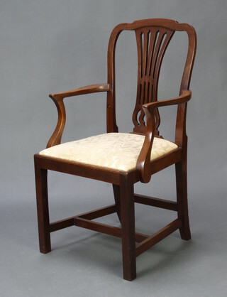 A Georgian style mahogany camel back carver chair with pierced vase shaped slat back, upholstered drop in seat and raised on square supports with H frame stretcher 99cm x 54cm x 45cm, inside seat 28cm x 29cm (water marks to teh cresting rail)