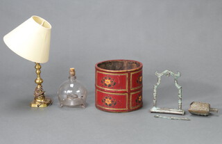 A circular wooden painted planter 20cm x 23cm, a glass candlestick converted for use as a lamp 26cm,  a glass wasp trap 17cm x 12cm (drilled) and a bronze table bell and stand 20cm x 15cm x 4cm
