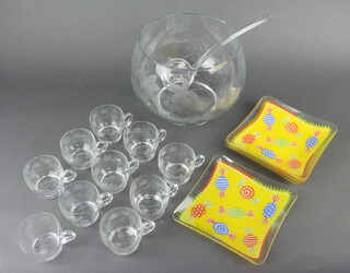 A Kroson glass punch bowl, ladle and ten etched glasses together with five 1950's square glass plates decorated sweets marked Pan for Palane 20cm x 20cm