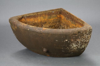 A 19th Century wall mounted iron corner animal feeder 34cm h x 50cm w x 50cm d 