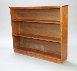 A mahogany D shaped bookcase fitted 3 shelves 101cm h x 125cm w x 22cm d (contact marks in places)