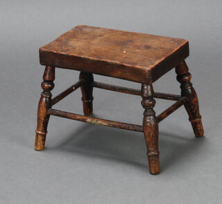 A 19th Century rectangular elm stool raised on turned supports with stretcher 21cm h x 25cm w x 26cm d 