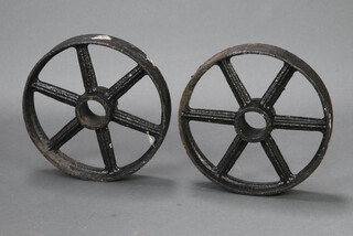 A pair of iron 6 spoked wheels 35cm diam. x 7cm wide 