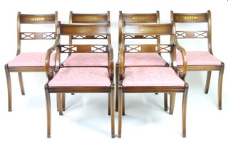 A set of 6 Georgian style mahogany bar back dining chairs with upholstered drop in seats raised on sabre supports (some contact marks in places) 