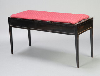 An ebonised box seat duet piano stool with hinged lid, raised on square supports 49cm h x 98cm w x 39cm d 