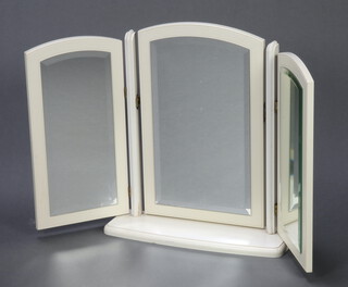 An arched triple plate dressing table mirror contained in a white painted frame 55cm h x 90cm w x 15cm d 
