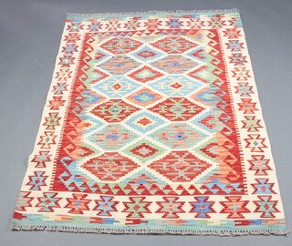 A blue, brown and green ground Chobi Kilim rug with diamonds to the centre 150cm x 107cm 
