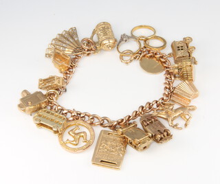 A 9ct yellow gold charm bracelet, 58.6 grams 