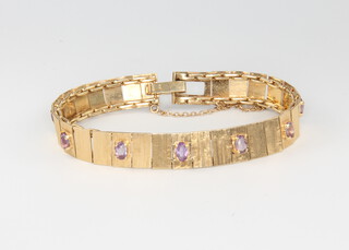 A 14ct yellow gold amethyst set bracelet, 23.5 grams 